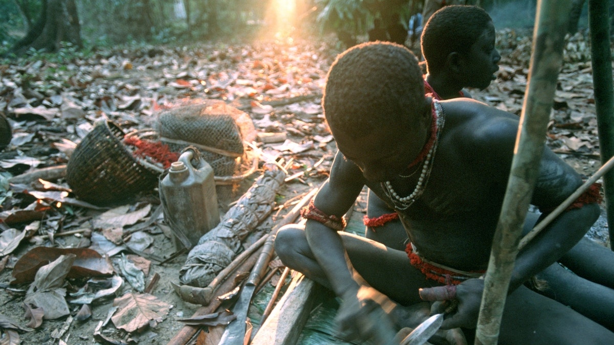 Members of the Jarawas tribe making an arrowhead