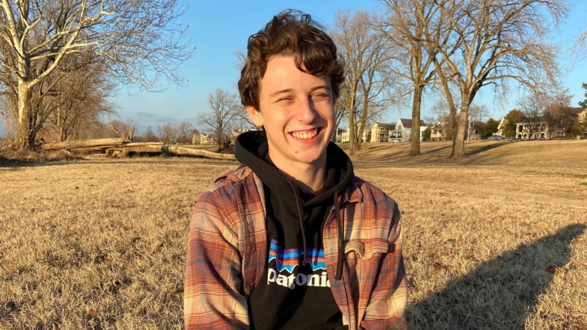 Andrew Rainer in a hoodie