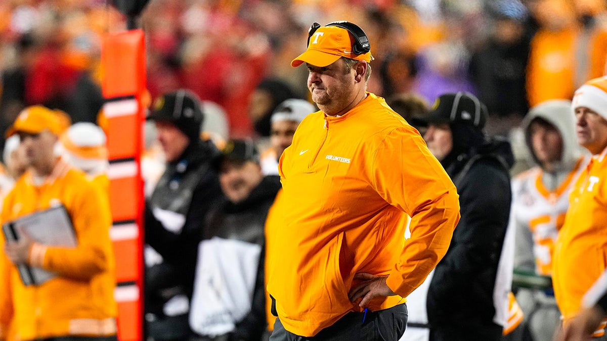 Josh Heupel looks on field