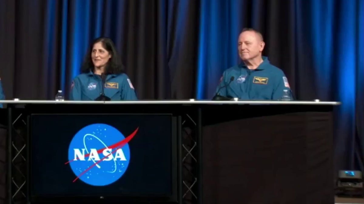 Sunita "Suni" Williams and Barry "Butch" Wilmore speaking to the press