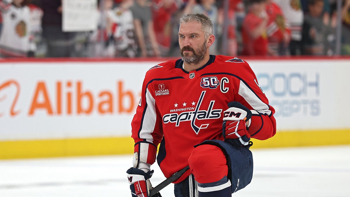 Ovechkin kneeling