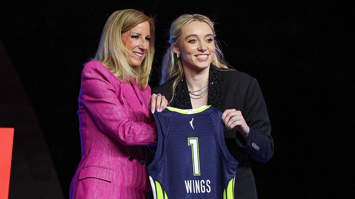 Paige Bueckers with WNBA commissioner Kathy Engelbert