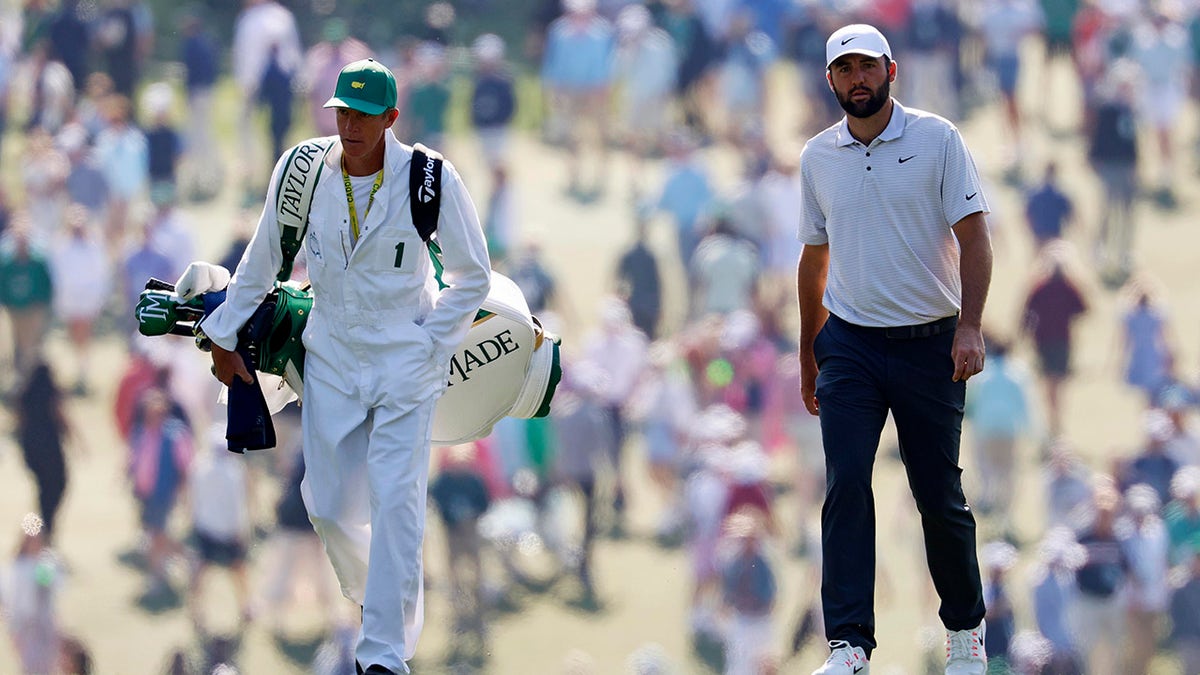 Scottie Scheffler walks