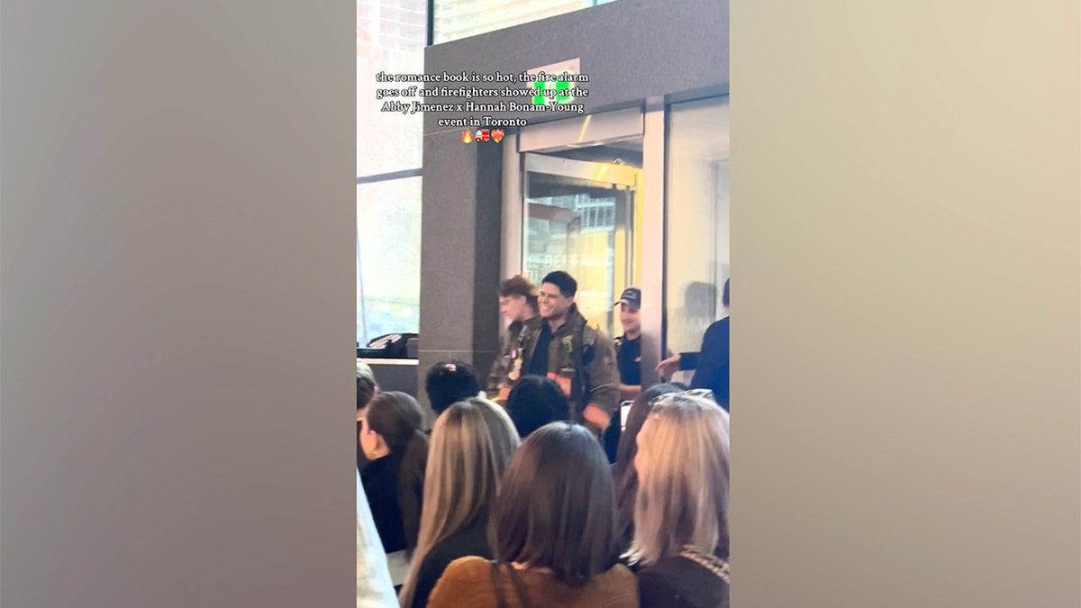 Sparks fly in real-life meet cute when firemen arrive at romance novel event
