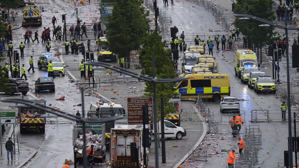 Man arrested after car drives into crowd in Liverpool, police say