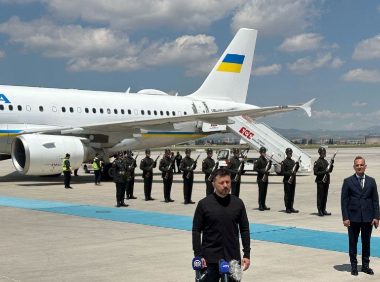 Ukrainian President Volodymyr Zelenskiy talks to members of media upon his arrival at Esenboga Airport in Ankara, Turkey, May 15, 2025. REUTERS/Huseyin Hayatsever