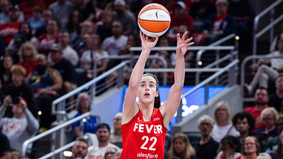 Caitlin Clark shoots three