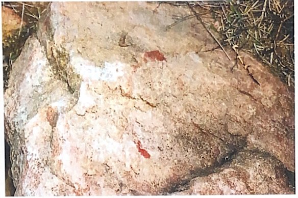 Blood found on the rocks of the retaining wall at the Crawford home. 