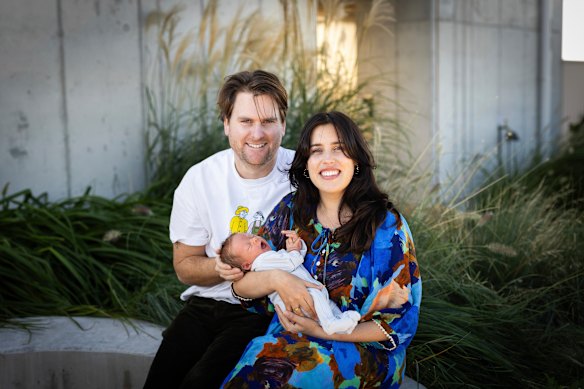 Alicia and Tom Walker with their newborn baby boy Heath.