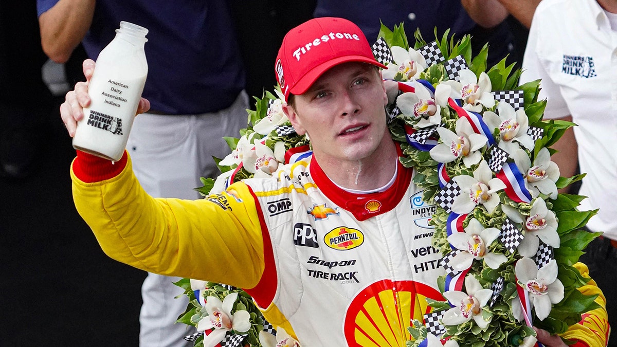 Josef Newgarden drinks milk