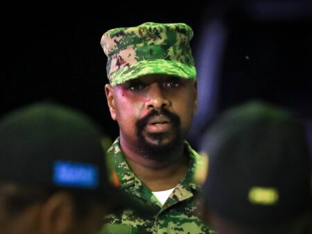 Uganda’s military chief says holding opposition activist ‘in my basement’