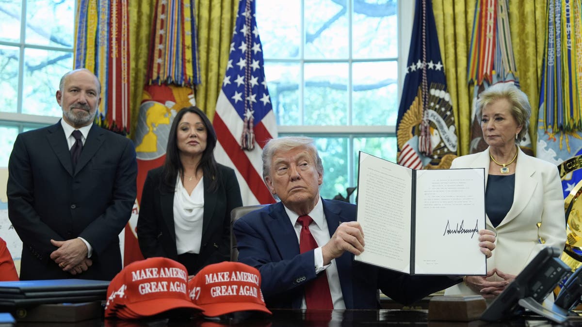 President Donald Trump with Linda McMahon in the Oval office