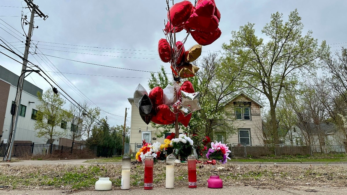 Items are placed as a memorial at the site of a late Tuesday fatal shooting, on Friday, May 2, 2025 in Minneapolis.
