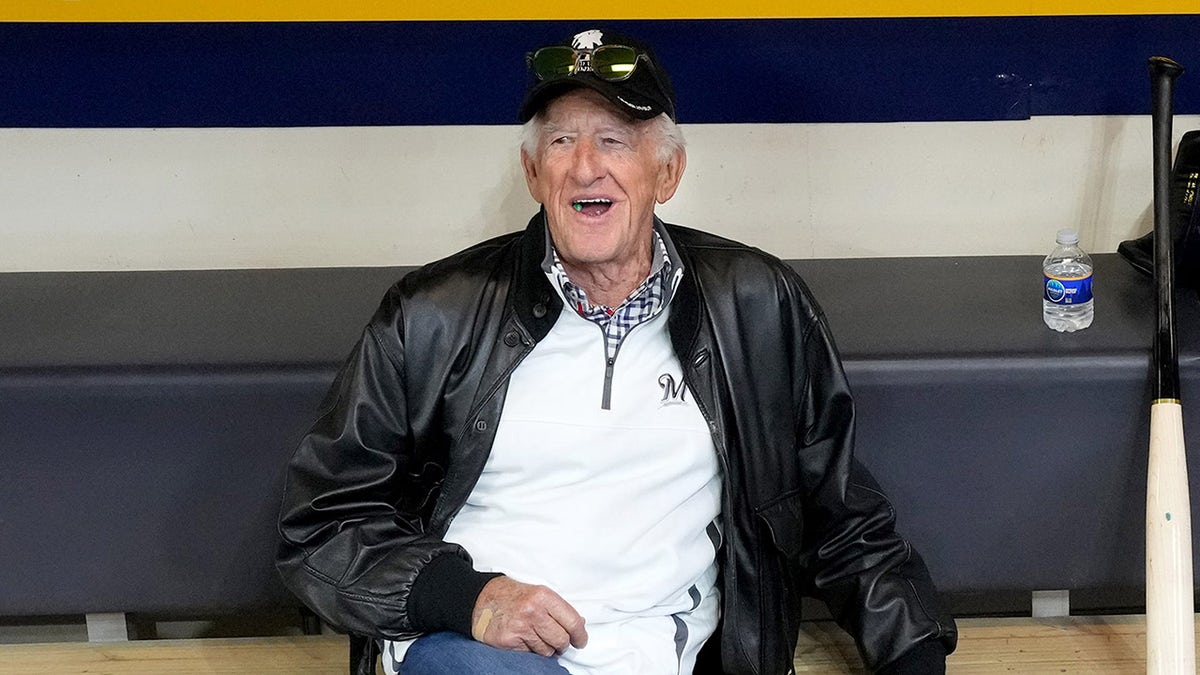 Bob Uecker looks on