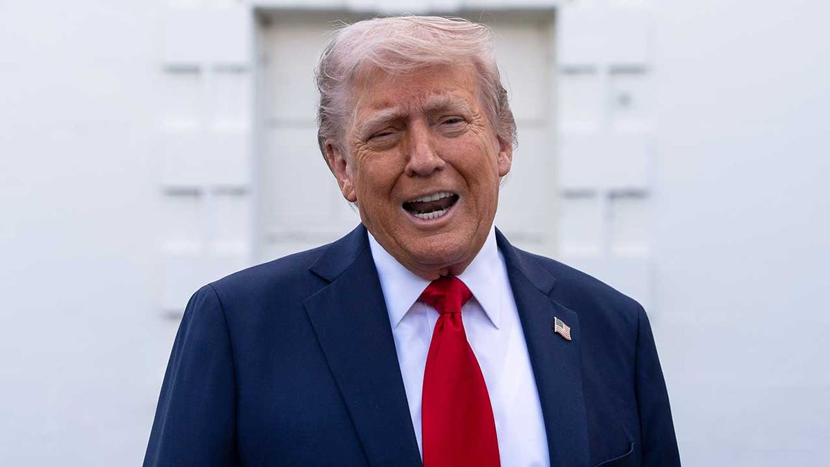 Trump talks to reporters in April 2025