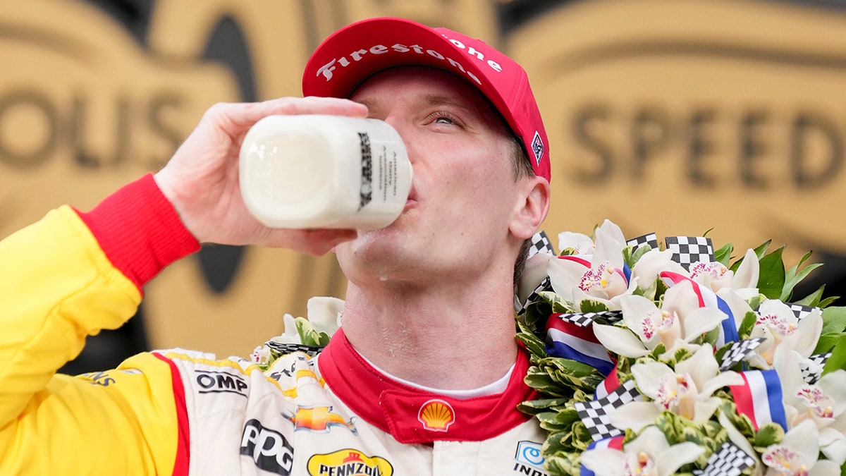 Josef Newgarden drinks milk