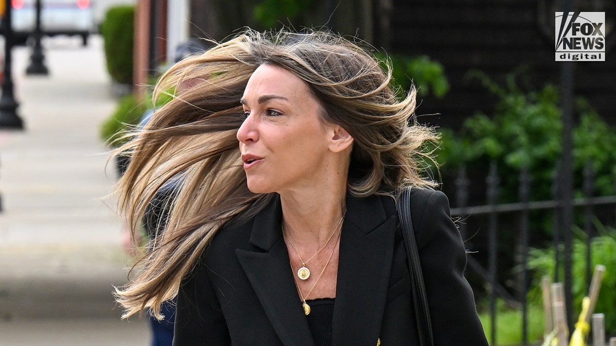 Karen Read walking into the courthouse for her re-trial facing charges for the death of John O'Keefe.