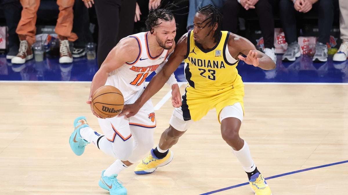 New York Knicks guard Jalen Brunson (11) controls the ball against Indiana Pacers forward Aaron Nesmith (23) in the fourth quarter during game two of the eastern conference finals for the 2025 NBA Playoffs at Madison Square Garden. 