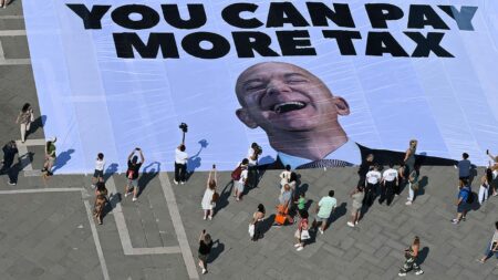 Wedding Protesters Say Bezos Should Pay More Tax. Here’s How Much He Likely Did Pay