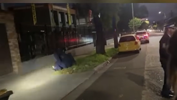 A screengrab from video posted to Instagram that was filmed during an altercation between NSW Police and protesters at a picketing of a business in Belmore on Friday. 