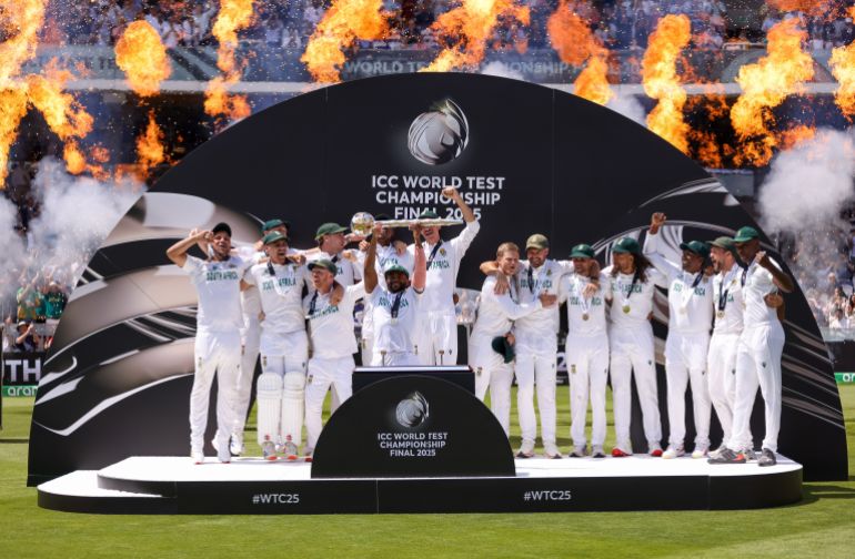Kagiso Rabada of South Africa celebrates with the trophy after winning the final during day 4 of the ICC World Test Championship, final match between South Africa and Australia at Lords Cricket Ground