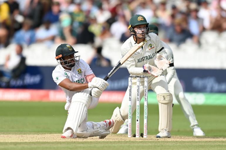 Temba Bavuma of South Africa bats watched by Australia wicketkeeper Alex Carey during day three of ICC World Test Championship Final between South Africa and Australia at Lord's Cricket Ground