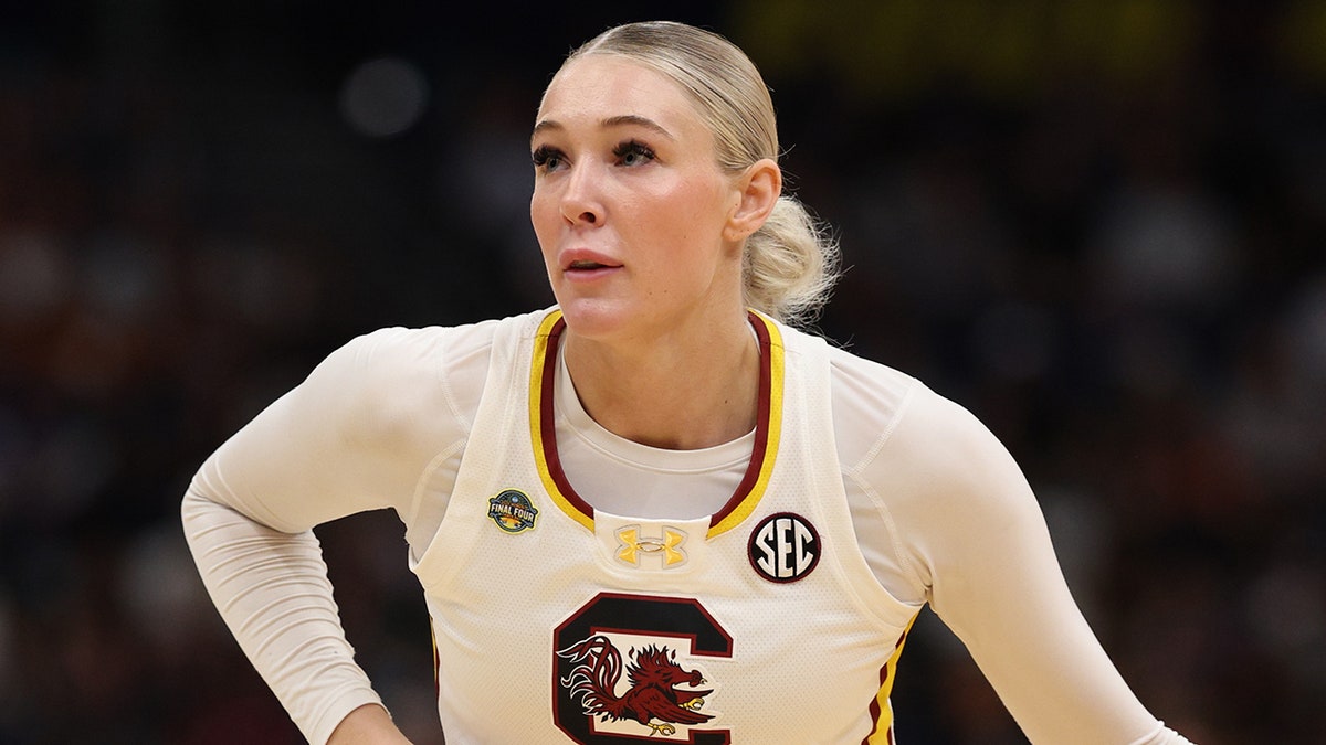 Chloe Kitts dribbles a basketball