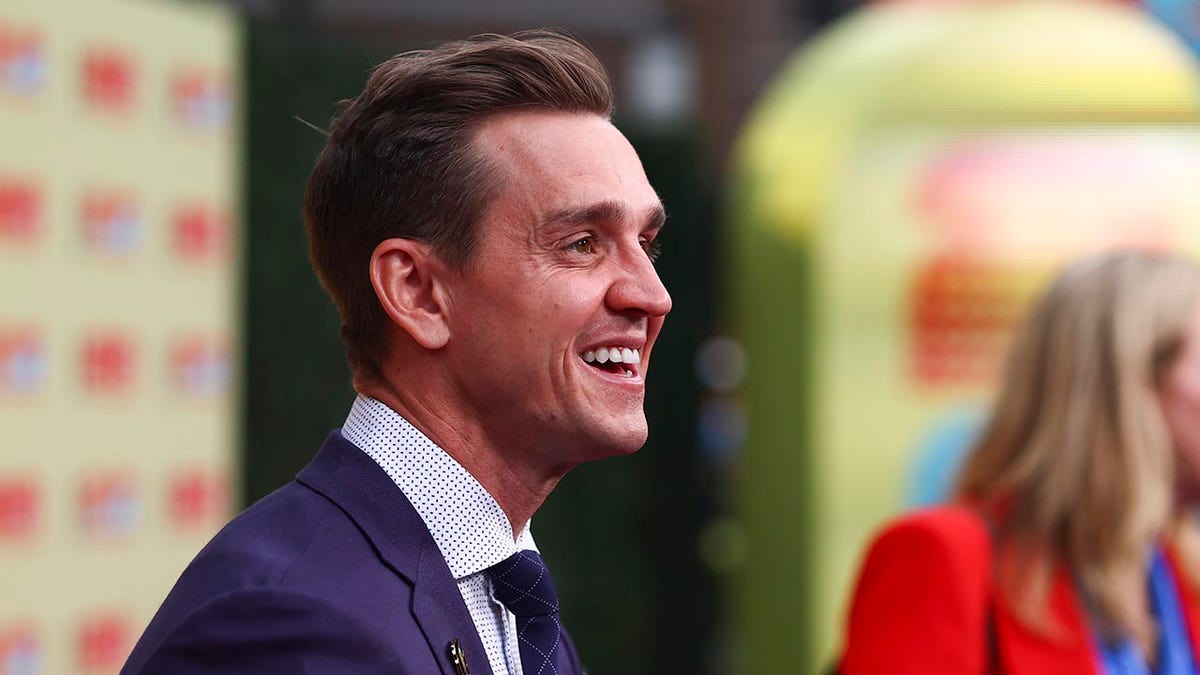 Stuart Holden looks on