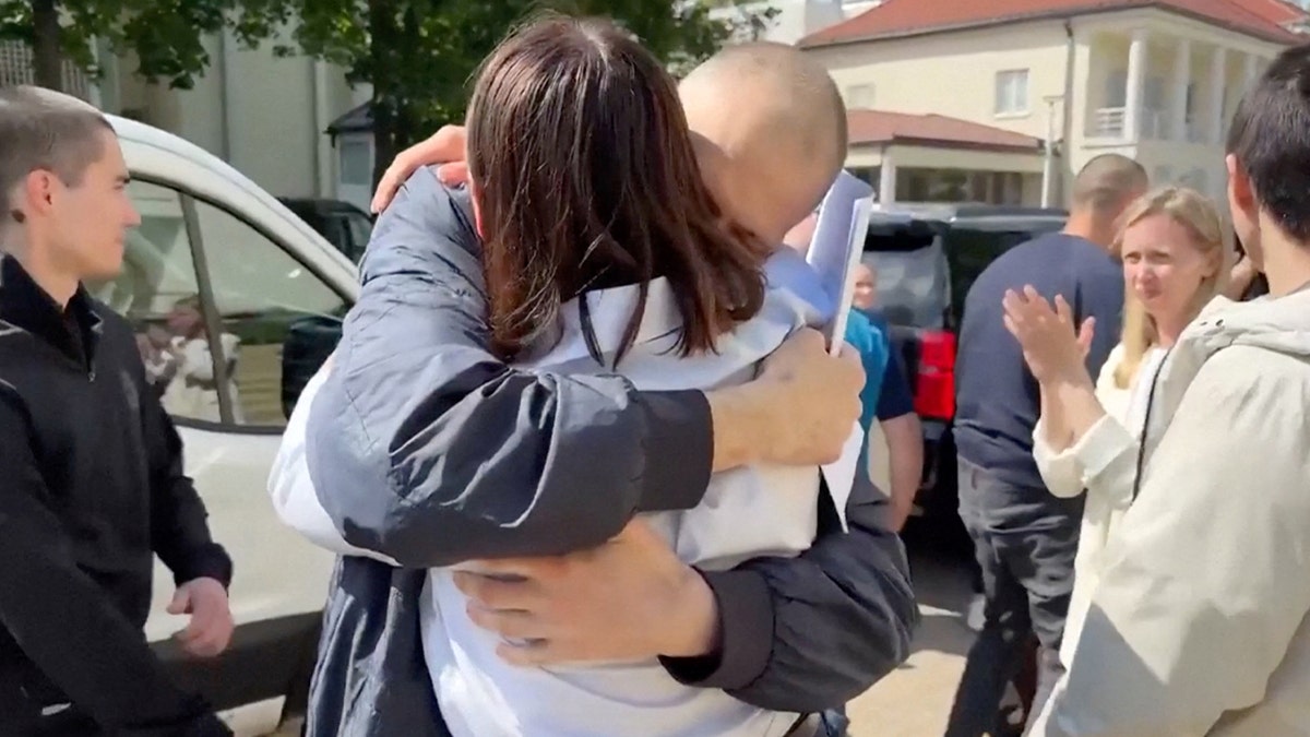Siarhei Tsikhanouski is reunited with his wife, Sviatlana Tsikhanouskaya