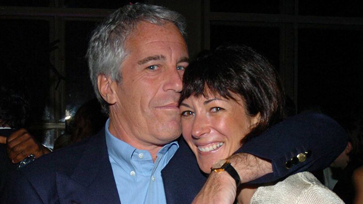 Jeffrey Epstein wraps his arm around Ghislaine Maxwell.