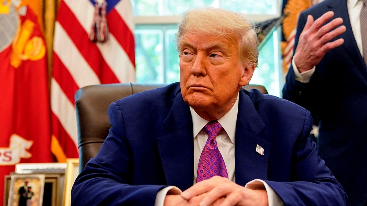 President Donald Trump sitting