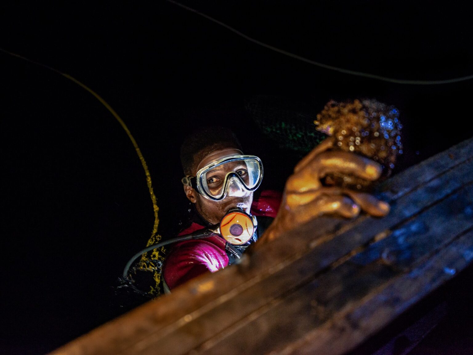 The night divers seeking sea cucumbers and profits off West Africa’s coast