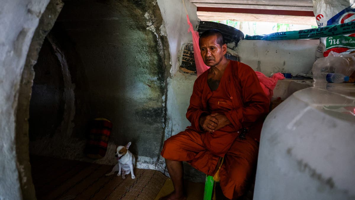 Buddhist monk in bomb shelter