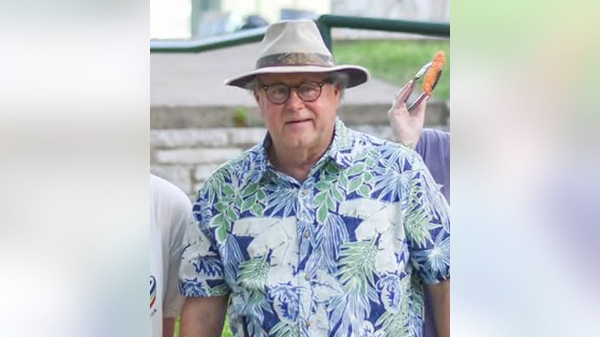 Dick Eastland wearing a hat