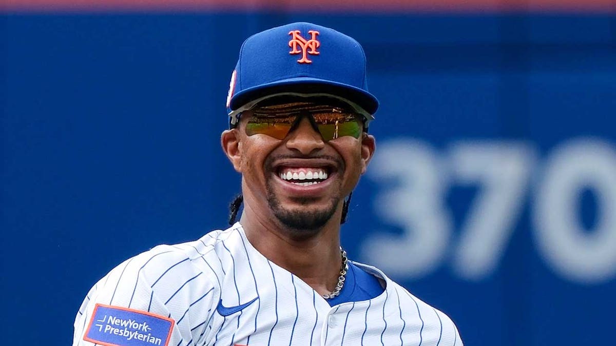 Francisco Lindor looks on