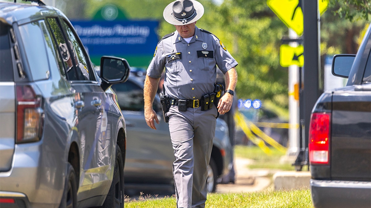 Police respond to Lexington church shooting.