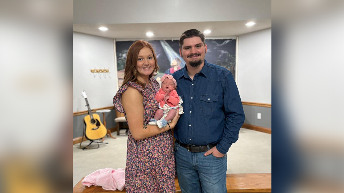 Hunter and Macey Lyons with daughter 