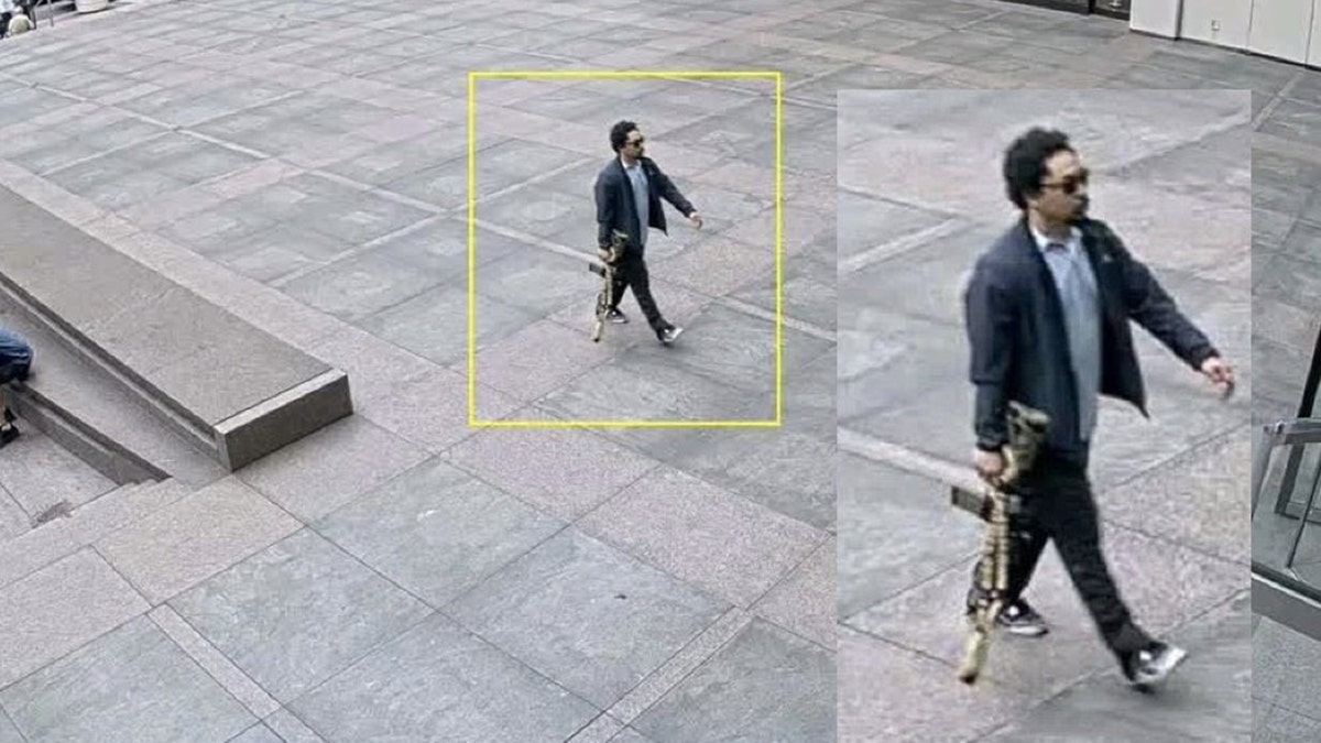 Manhattan gunman seen outside building