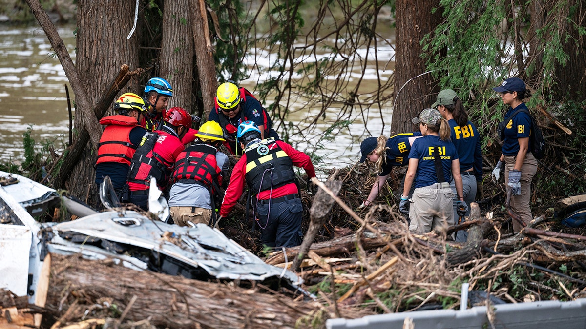 Rescue and search teams in Texas after flash flooding.