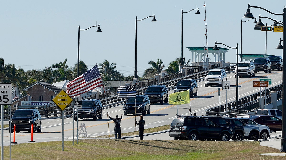 President-elect Donald Trump's motorcade passes along Southern Boulevard as it returns to Trump's Mar-a-Lago Club.