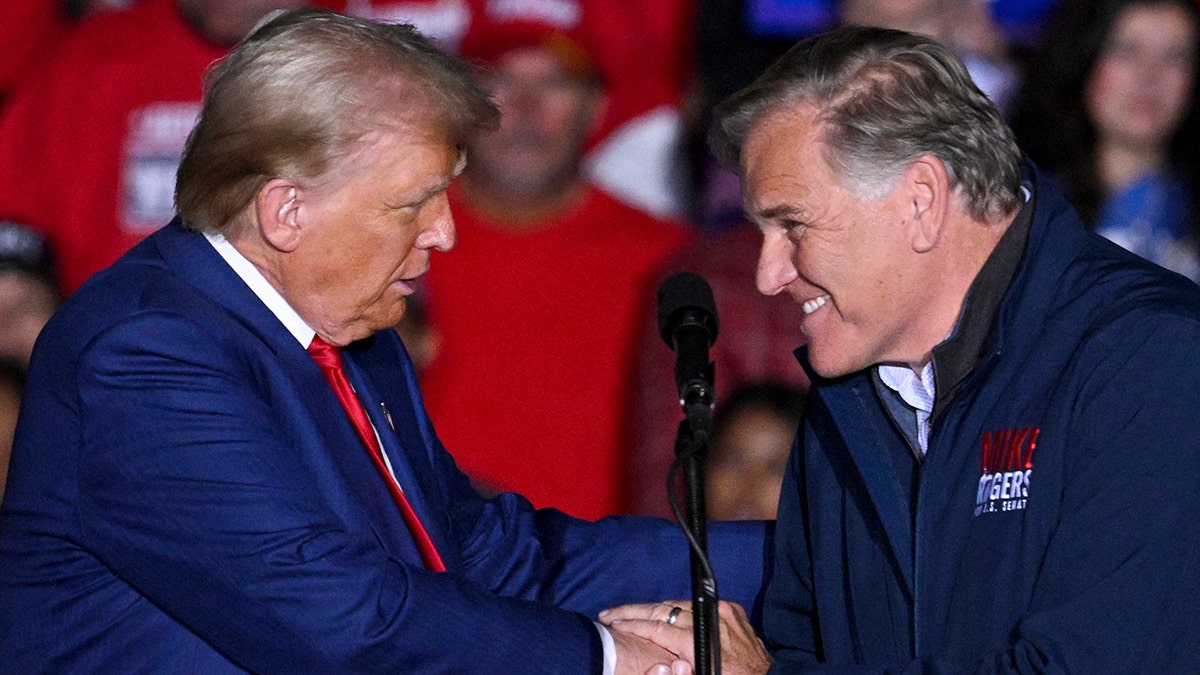 Former President Donald Trump and former Rep. Mike Rogers in 2024