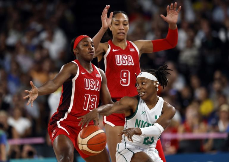 Jackie Young of USA (L) and Ezinne Kalu of Nigeria (R) in action during the Women Quarterfinal game Nigeria vs USA of the Basketball competitions in the Paris 2024 Olympic Games