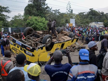 Bus carrying mourners overturns in Kenya, killing 25 people