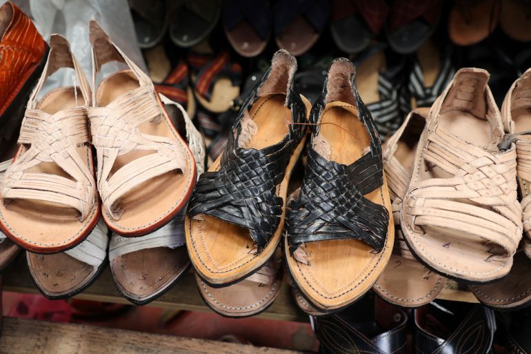 Sandals known as "huaraches" are displayed for sale at a market in Oaxaca, Mexico, Friday, Aug. 8, 2025. (AP Photo/Luis Alberto Cruz)