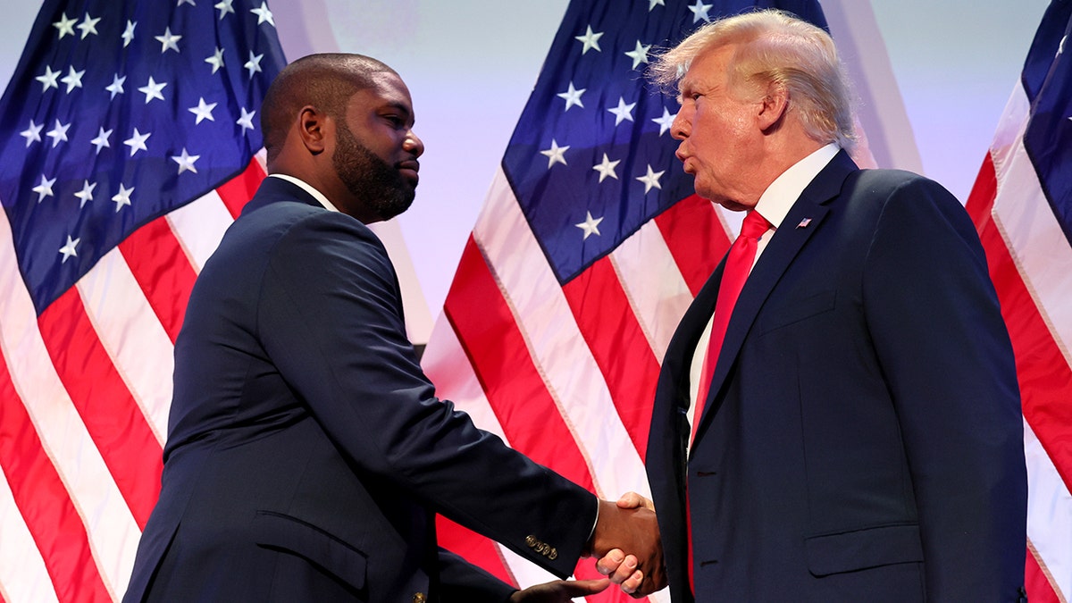 Rep. Byron Donalds shakes former President Trump's hand in 2023