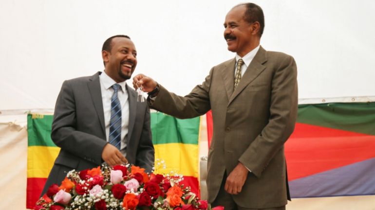 Eritrea''s President Isaias Afwerki receives a key from Ethiopia''s Prime Minister Abiy Ahmed