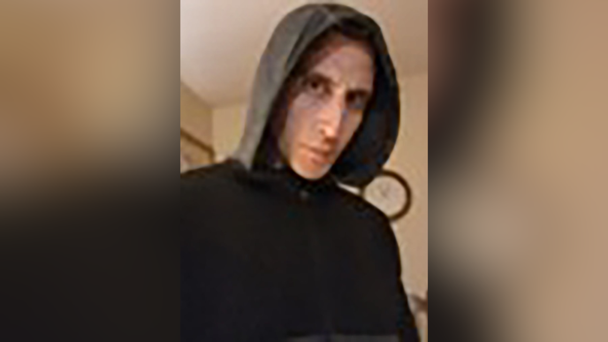 Bryan Kohberger wearing a dark hooded sweatshirt