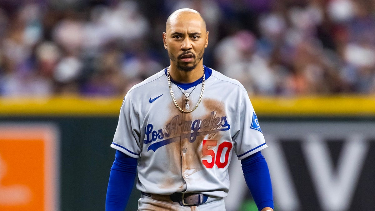 Mookie Betts looks on
