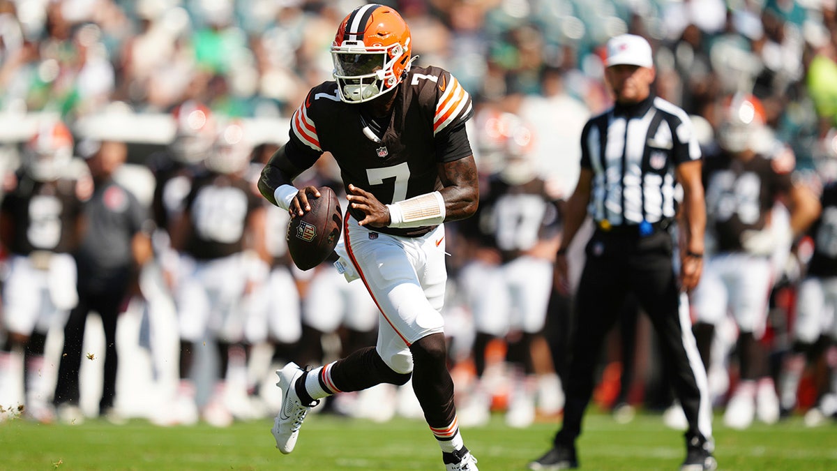 Tyler Huntley looks down the field