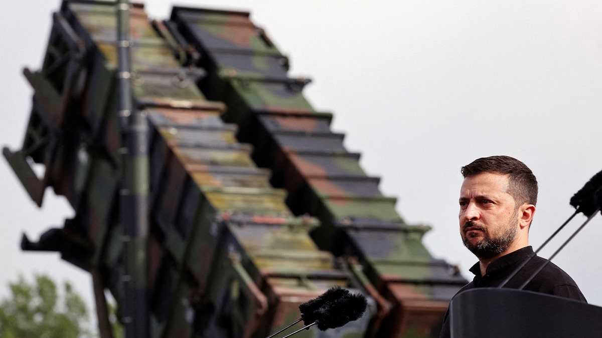 Ukrainian President Volodymyr Zelenskiy looks on during a visit to a military training area to find out about the training of Ukrainian soldiers on the Patriot missile system, at an undisclosed location in Germany, June 11, 2024.